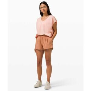 LULULEMON Capped Short-Sleeve Tee in Pink Mist Pique Microfiber Size 12 (est)